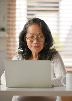 A women working on her laptop