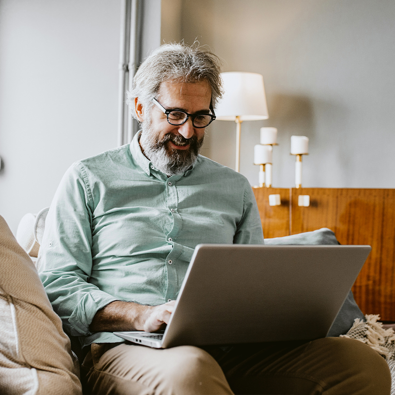 Man looking at his laptop