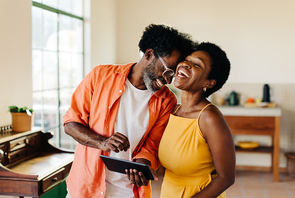 couple in their 60s laughing together