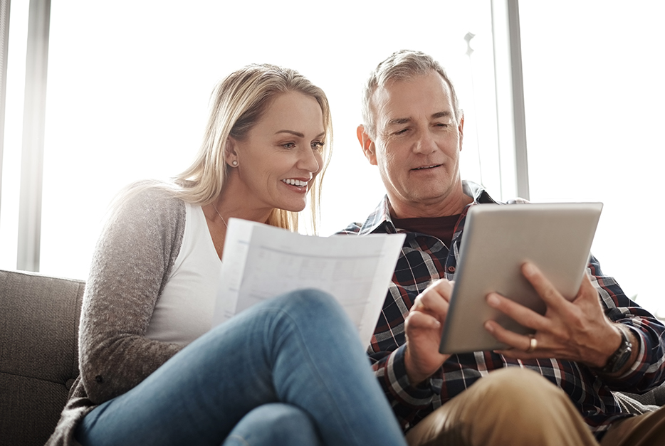 Couple sitting and planning a budget together