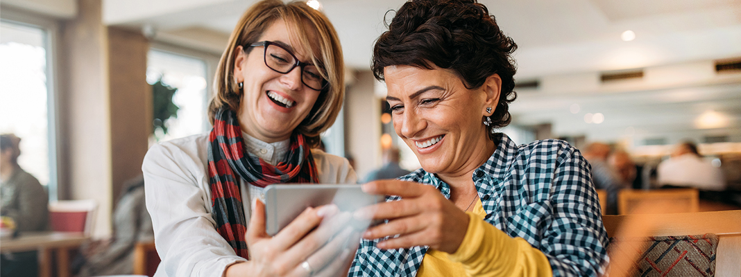 Two women smiling 