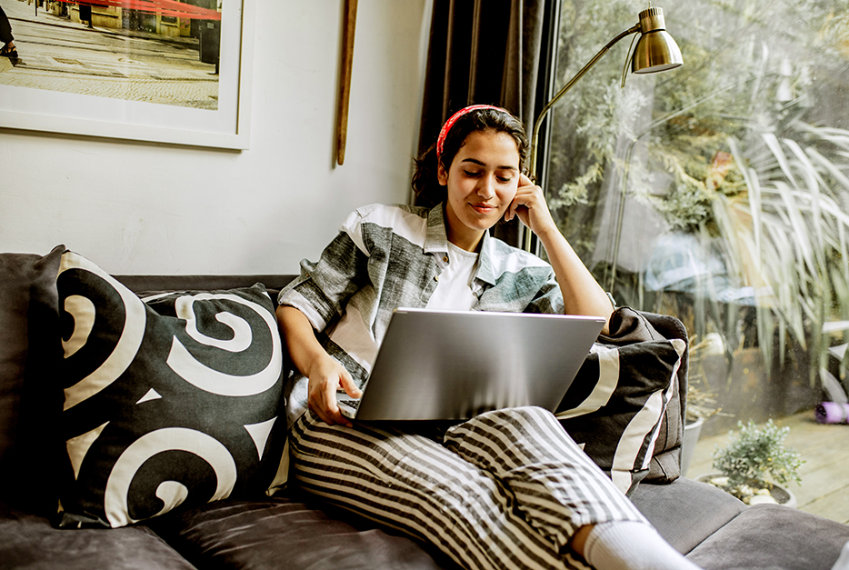 Student studying on her laptop