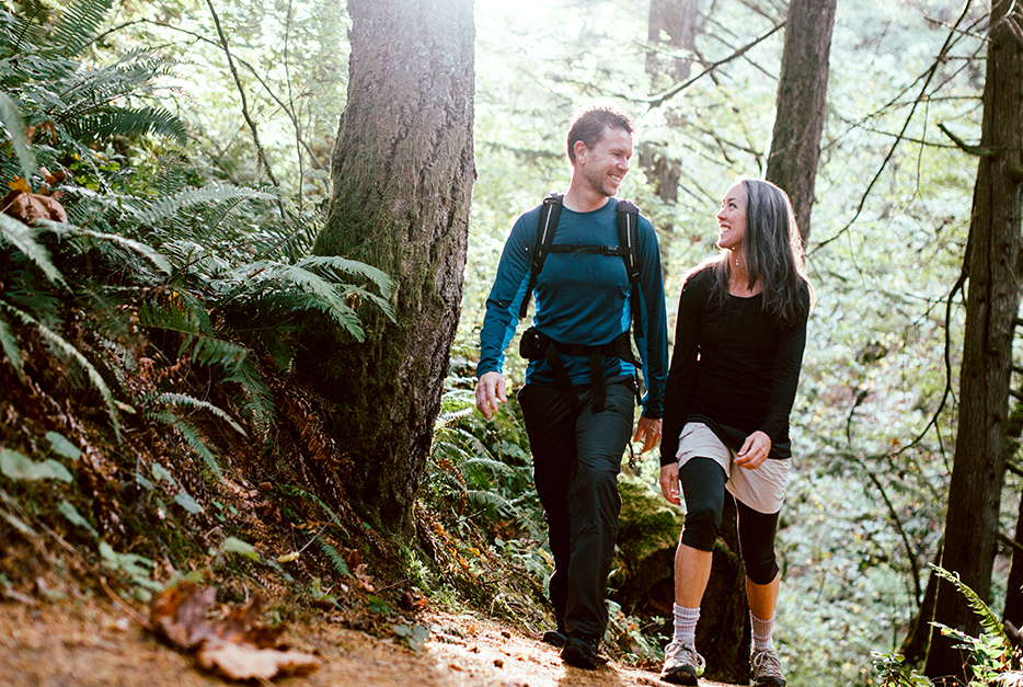 Couple hiking in the woods together