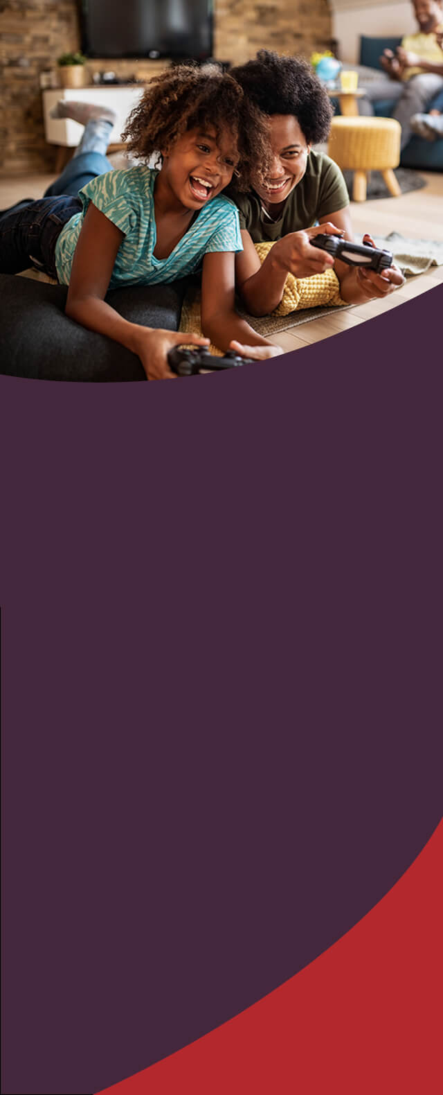 A mom and daughter playing video games