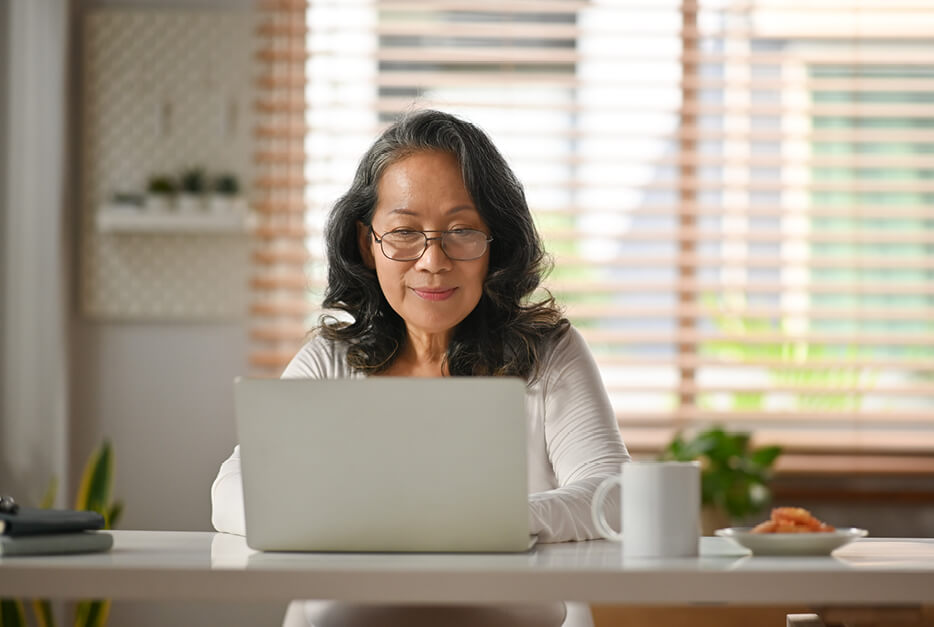 Women working on her laptop