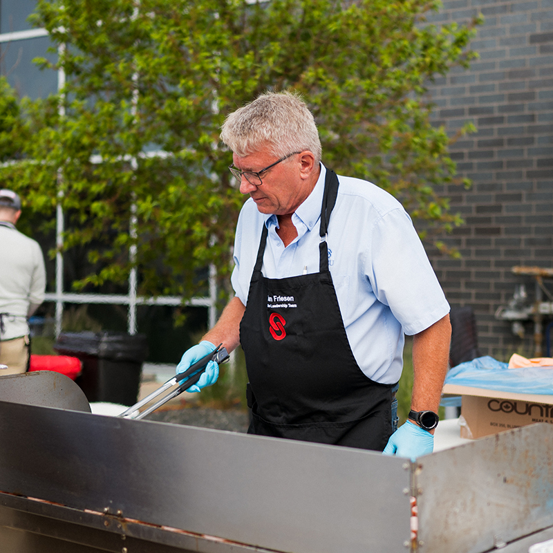 Man cooking food on the grill