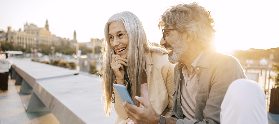 Couple looking at phone together
