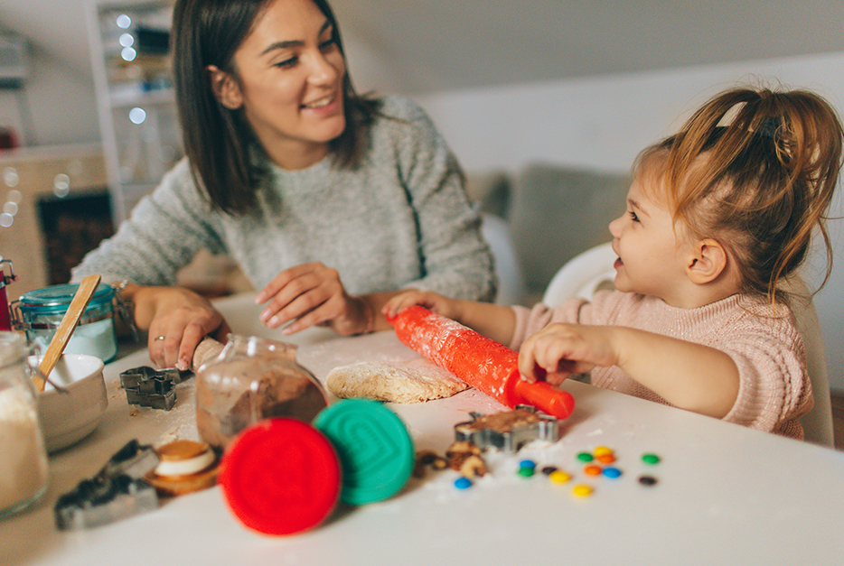 Mom playing toys with her daughter