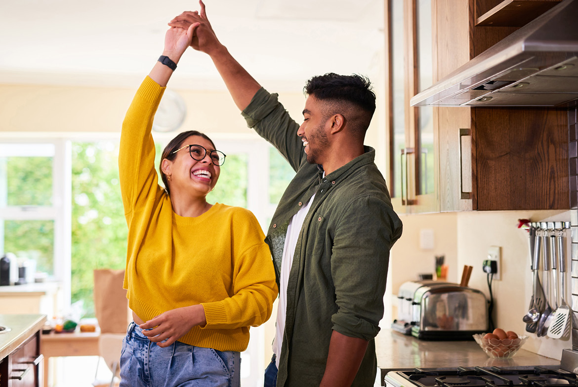 couple dancing in their house