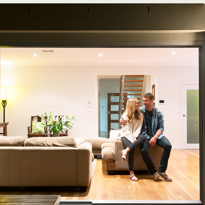 Couple sitting in living room