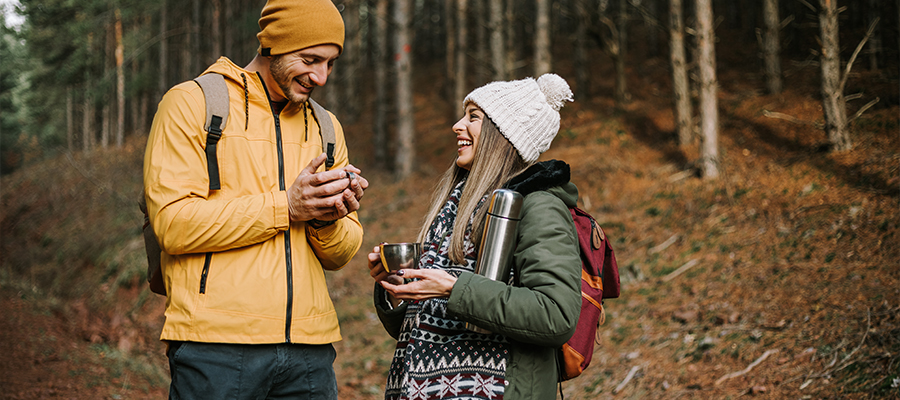 Couple hiking together in the fall