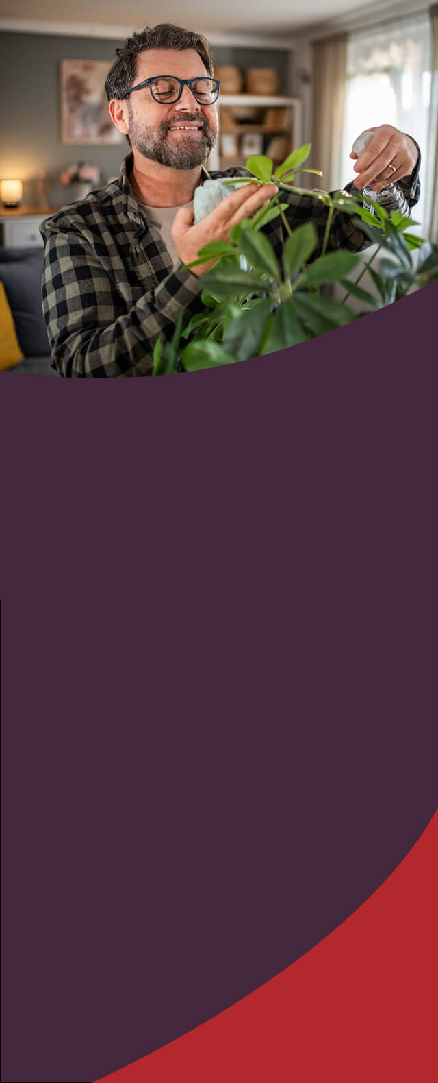 man watering his plants