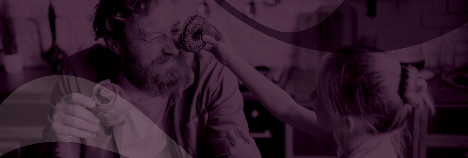 Purple stylized image of dad playing with son