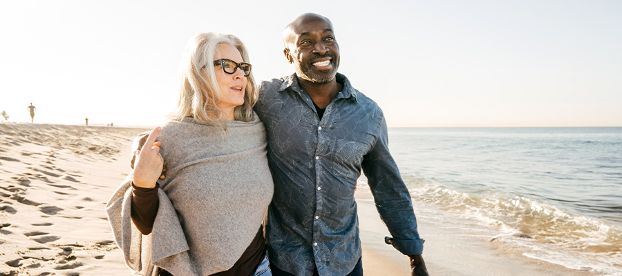 Couple walking on beach