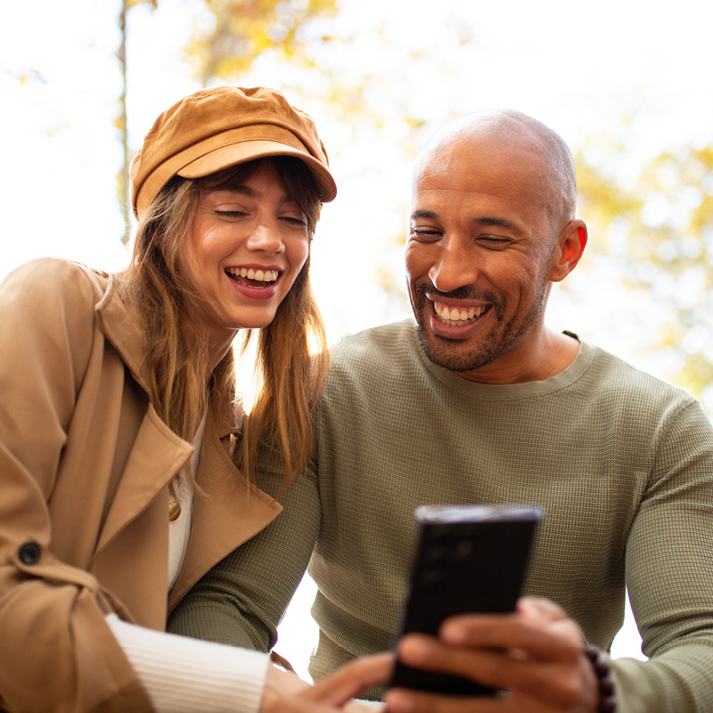 Couple looking at a phone