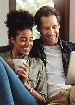 A couple smiling