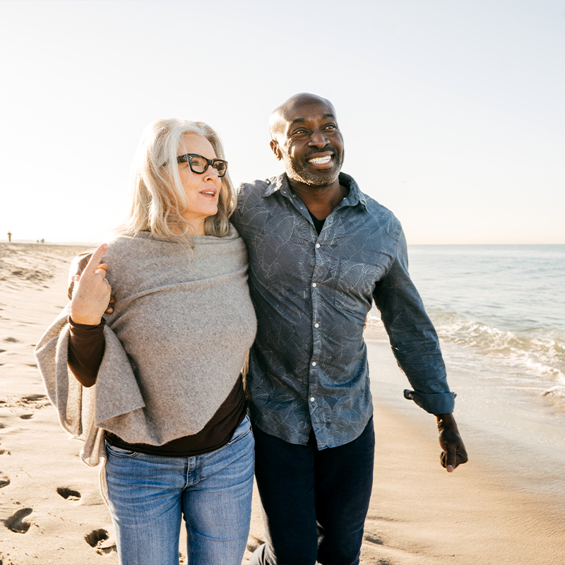 Couple walking on beach