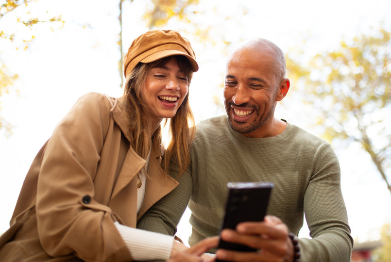 Couple looking at a phone