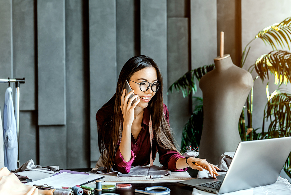 woman entrepreneur at computer working